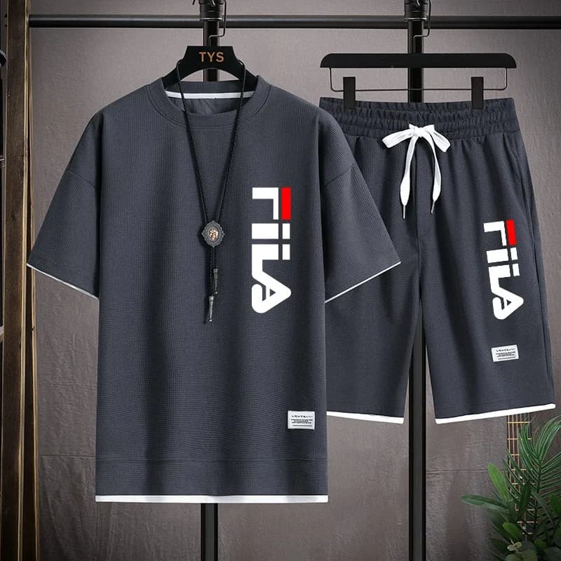 New elegant men's set with short sleeve t-shirt printed in waffle fabric and shorts - a two-piece summer suit for fitness, sports and leisure