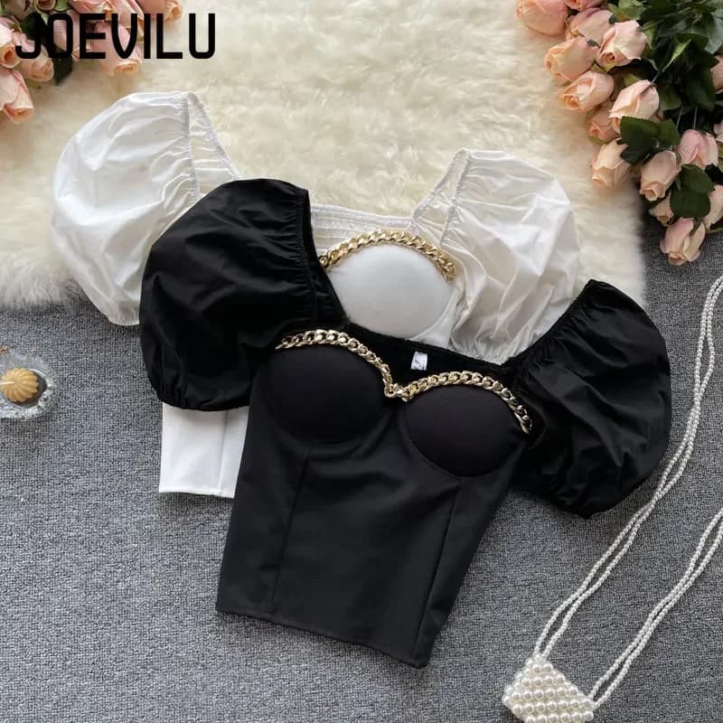 Camicia con ombelico Chic catena con spalle scoperte Esporre canotta con clavicola Top corto estivo con maniche a sbuffo Camicette sottili sexy eleganti da donna