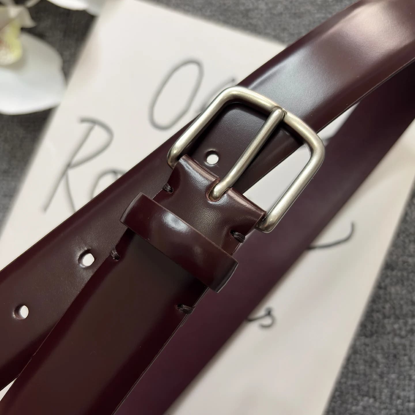 Simple cow leather belt, casual women's belt in real leather, trouser belt with dark red texture
