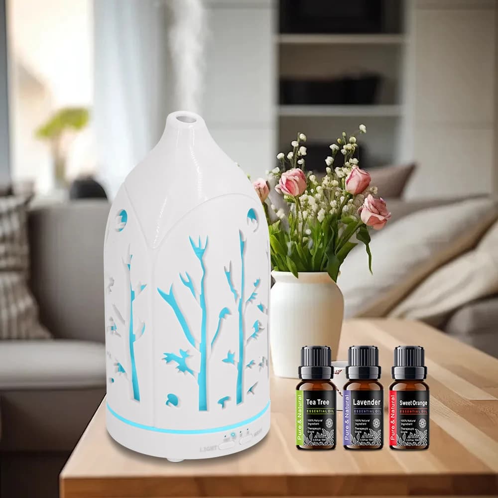 Il diffusore per aromaterapia scavato a 7 colori include 3 oli essenziali, spegnimento automatico e funzionamento silenzioso