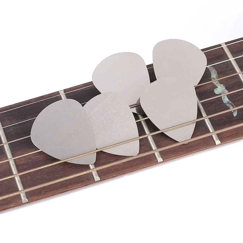 10 pz/pacco Plettri per Chitarra Plettro 0.3mm In Acciaio Inox Metallo Chitarra Elettrica Basso Plettro Parti e Accessori per Chitarra GYH