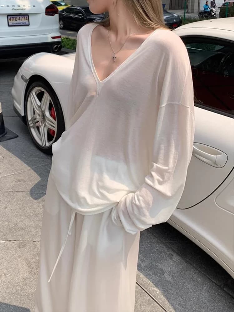T-shirt oversize da donna primavera estate scollo a V moda casual allentata sottile manica lunga top pullover chic bianco trasparente T-shirt