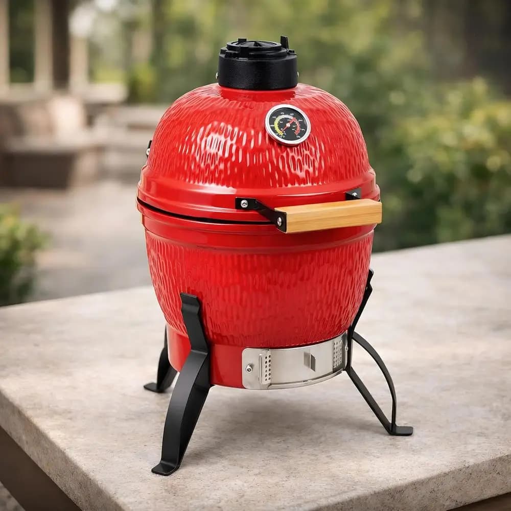 Portable 13-inch Oval Kamado Grill with Cast Iron Grates, Bamboo Handle, and Built-in Thermometer for Patio and Deck Grilling in