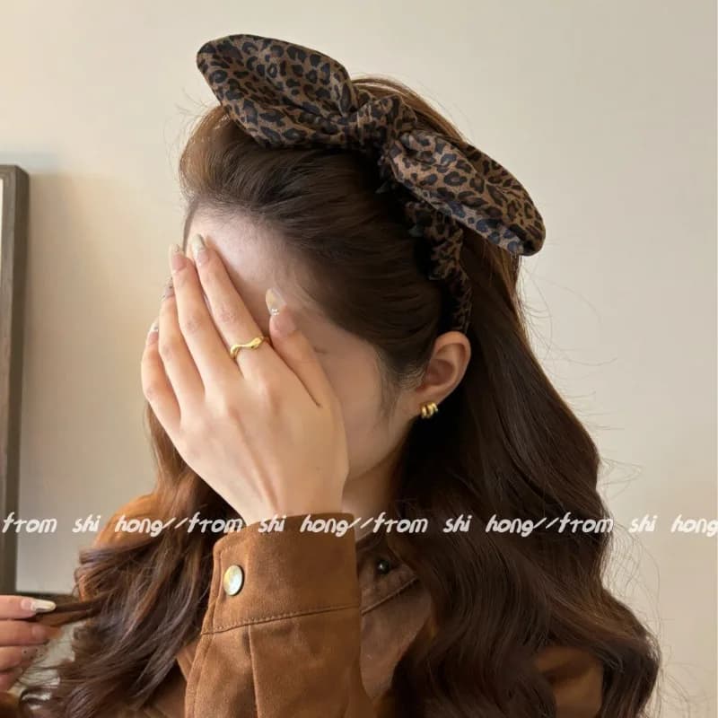 Fascia per capelli coreana con fiocco con stampa leopardata Fascia per capelli con impugnatura antiscivolo con design a orecchie da coniglio per fermaglio per capelli dimagrante viso ad effetto corona alta