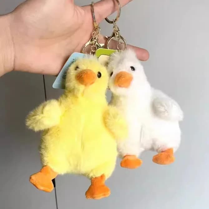 new Cute Fragrant cartoon lazy duck A plush keychain backpack that can be called by BB Car pendant claw machine doll