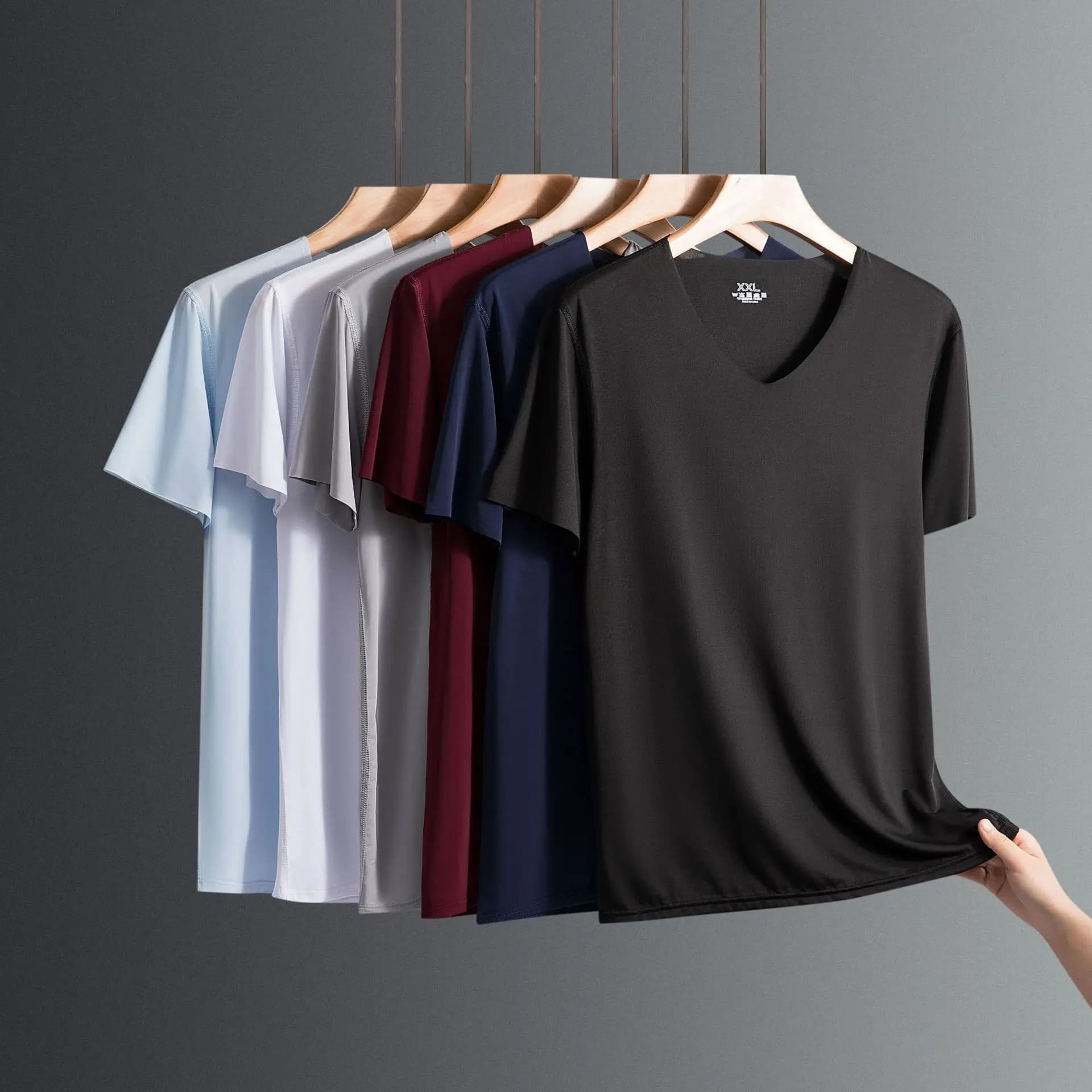 2025 T-shirt da uomo sottile a maniche corte in seta di ghiaccio senza tinta unita estiva Trace Slim scollo a V fondo manica corta senza cuciture