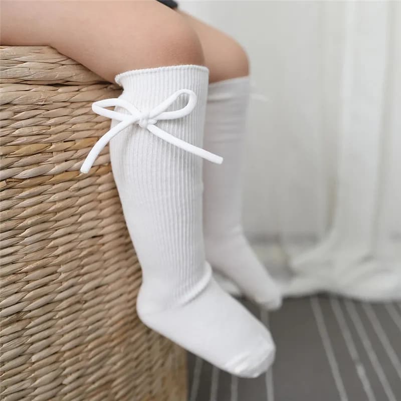 Calzini alti al ginocchio per bambini autunnali Neonate Ragazzi Bowknot Calzino lungo piatto Morbido cotone solido Bambini Principessa Socken per 0-7 anni