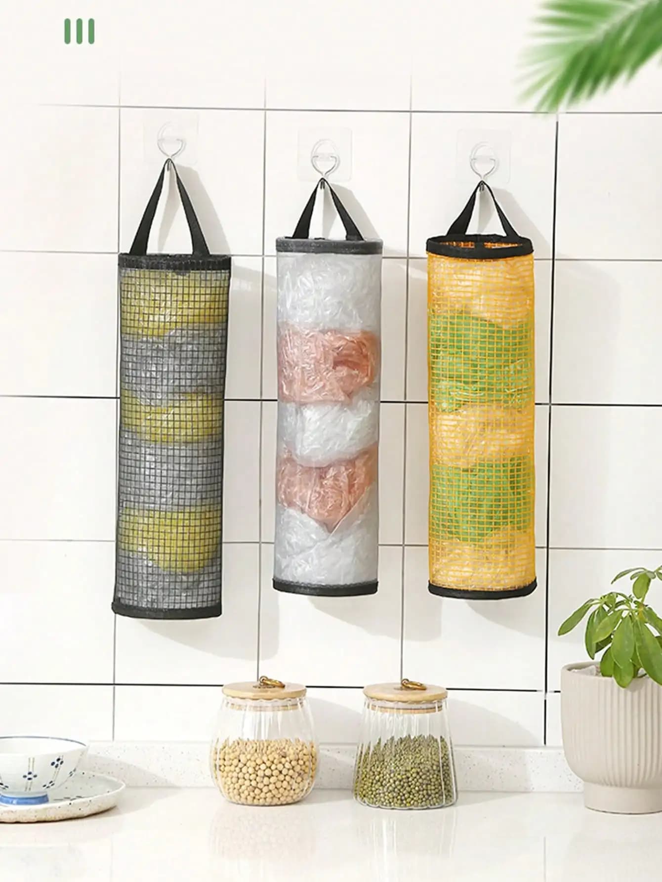 1PC Wall Mounted Mesh Trash Bag Dispenser, Hanging Garbage Bag Storage Organizer with Handle, No Drill Hook Installation, Space Saving Plastic Bag Holder for Kitchen Cabinet Door, Laundry Room, Bathroom, RV Camper
