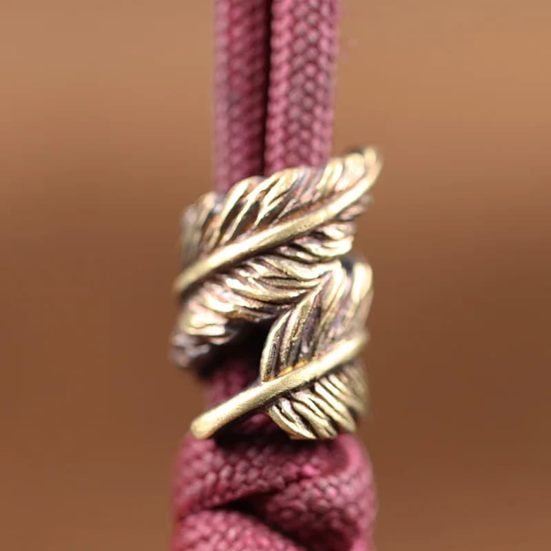 Plume brass blade beads, DIY paracord bracelet accessories, lace pendants, umbrella and torch rope decorations, for EDC use and outdoor activities
