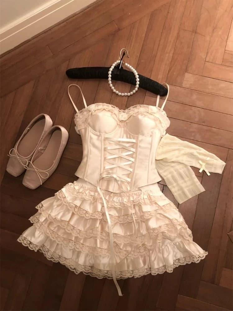 Estate francese elegante dolce due pezzi set da donna senza maniche in pizzo design fasciatura top sexy + minigonna torta a vita alta Y2k nuovo