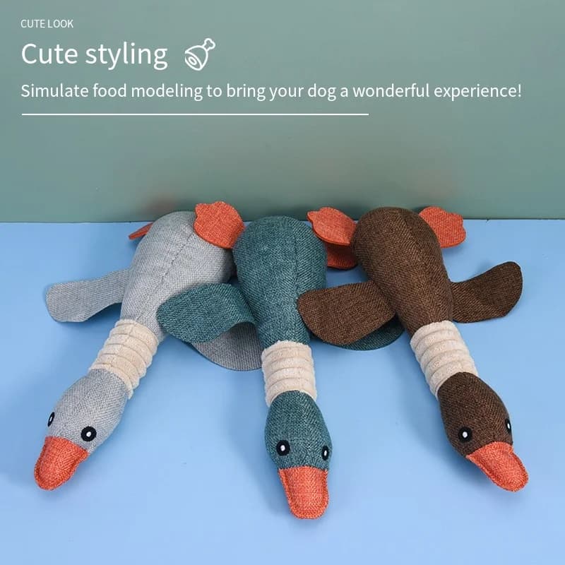 Simpatici giocattoli di peluche per cani Giocattolo di addestramento con cigolio di anatra per animali domestici per il suono del cucciolo Giocattolo stridulo da masticare con oca selvatica per la pulizia dei denti dei cani