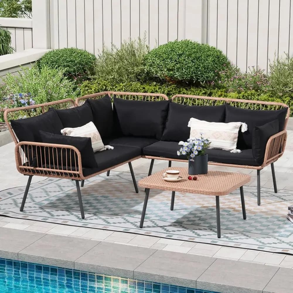 Set divano componibile da esterno in vimini nero a 4 pezzi con cuscini e tavolino quadrato per patio, balcone o giardino