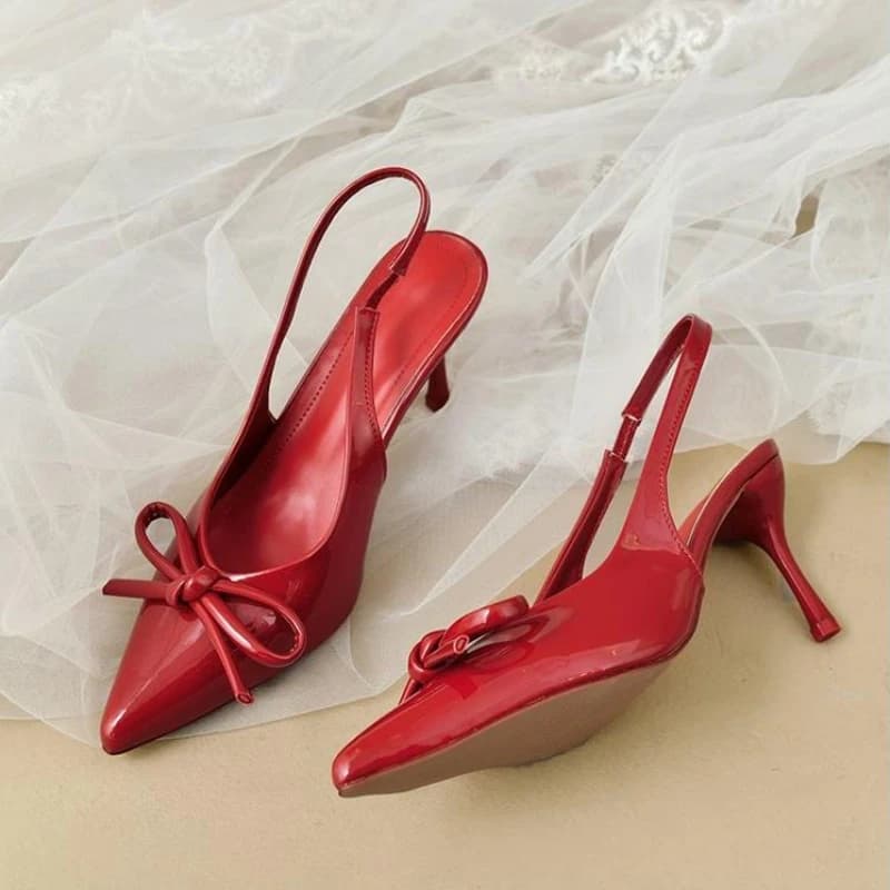 2025 Scarpe con tacco alto in pelle verniciata da donna di nuovo arrivo Scarpe a spillo con fiocco Bowknot Scarpe da festa e formali Sandali eleganti a spillo