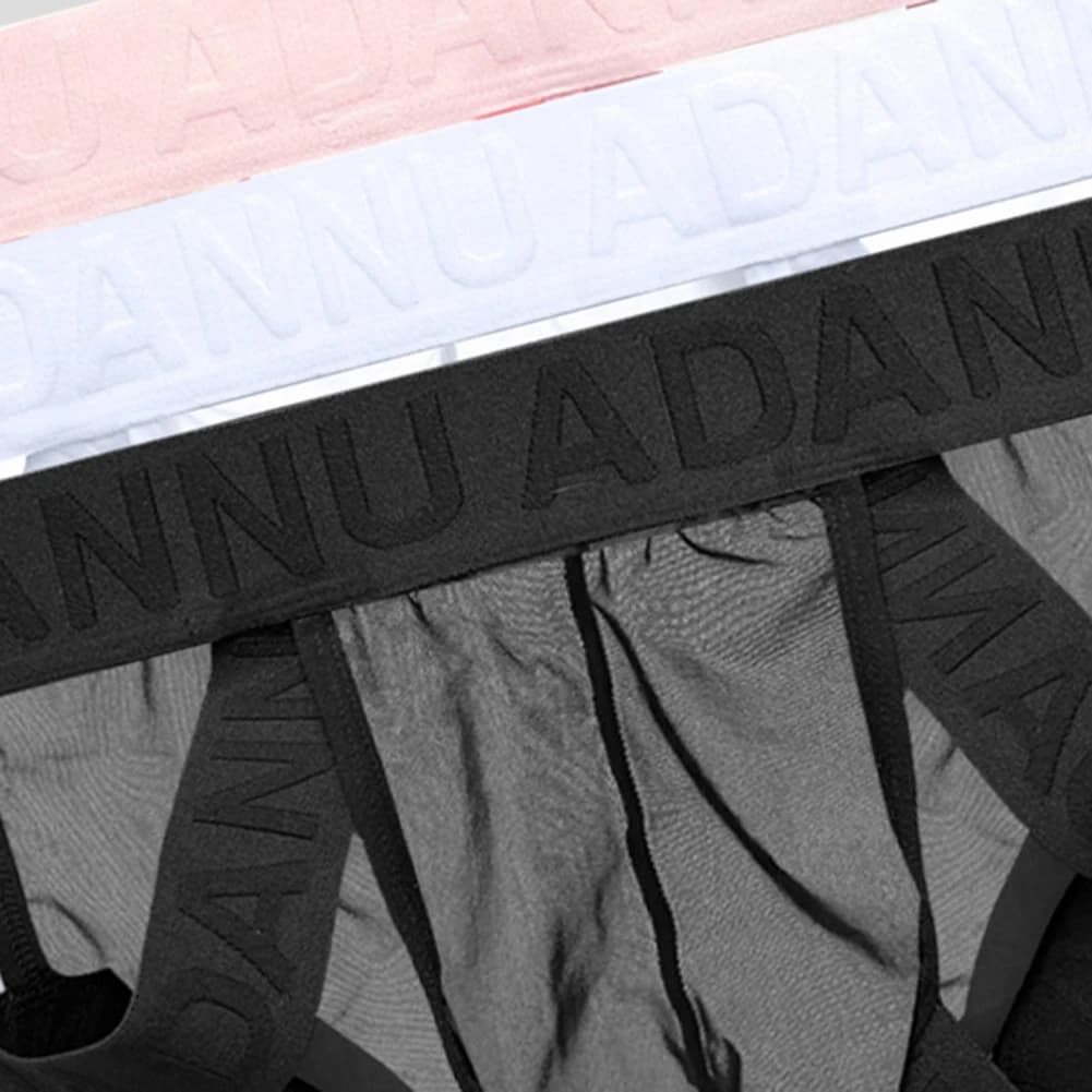 Slip da uomo in tinta unita con lettera, comodi senza cuciture, lingerie sexy alla moda, biancheria intima a vita bassa, cava e traspirante