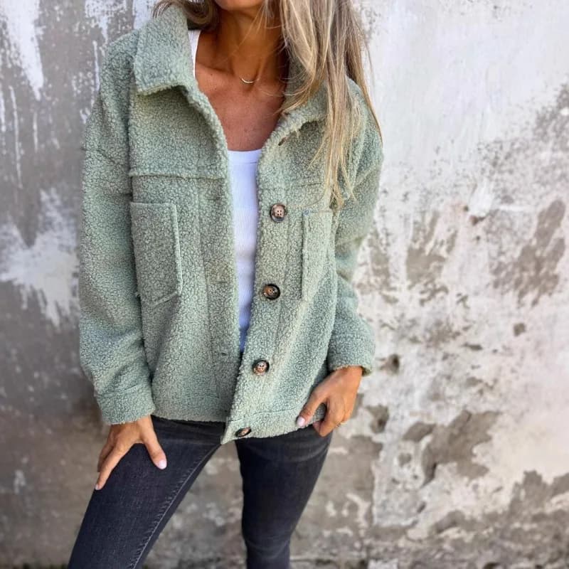 Cappotto da donna in pelliccia di agnello monopetto con risvolto autunno e inverno