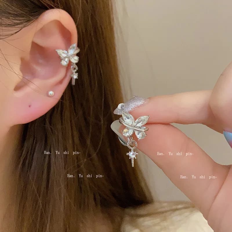 Clip per orecchie a farfalla con stella di mango tempestati di diamanti Orecchini di nicchia di lusso leggeri Clip versatili per ossa dell'orecchio alla moda da donna