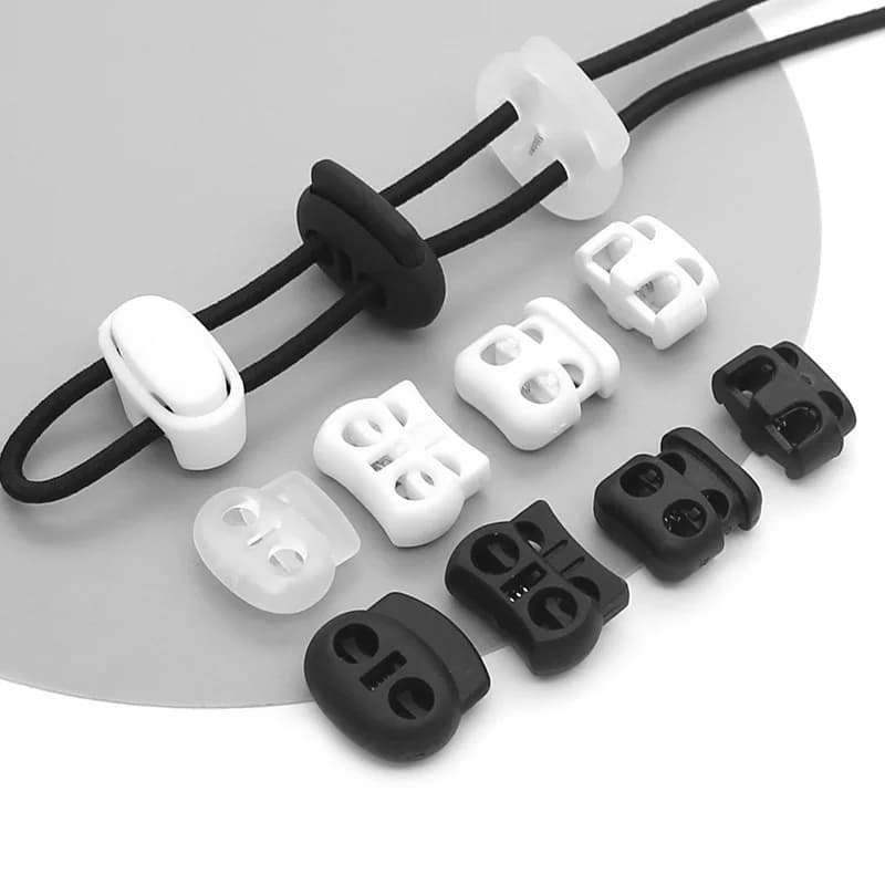 12 pz Cavo di Plastica Blocco Tappo Toggle Clip Blocco Fermo per Coulisse Cordino Elastico Corda Paracord Sacchetto di Indumento Accessori