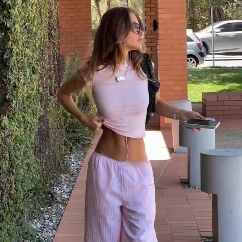 Lioness 2025 Moda Casual Semplice Spice Girl Top a maniche corte slim a righe Set di pantaloni lunghi a righe rosa larghi