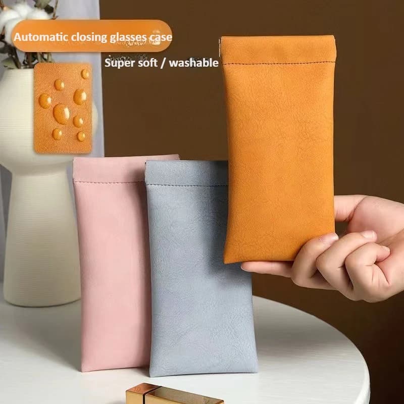 Custodia per occhiali in pelle unisex Cerniera a molla portatile con chiusura automatica per occhiali da sole Custodia per occhiali da sole portatile super morbida in tinta unita
