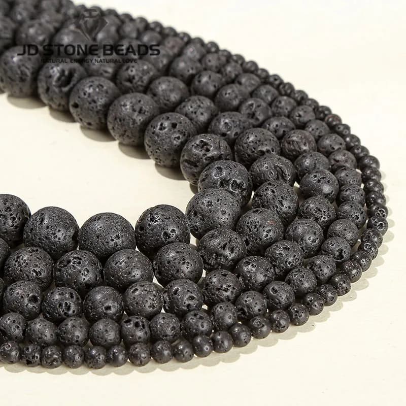 Perle di fascino allentate vulcaniche rotonde di pietra lavica nera naturale all'ingrosso per gioielli che fanno accessorio per collana braccialetto fai da te