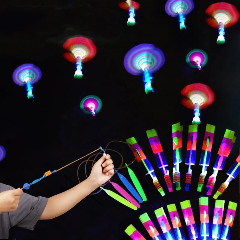 Giocattolo a razzo flash esterno Luci a LED Incandescente Fionda a razzo Elicottero Giocattolo volante Festa per bambini Regalo divertente Elastico Espulsore Giocattoli