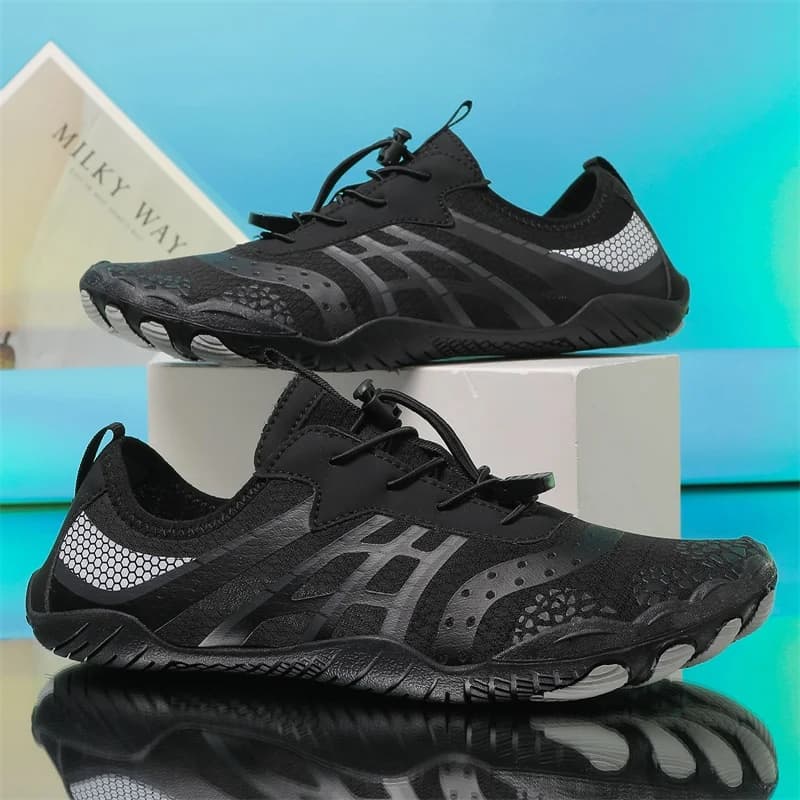 Scarpe da trampolino per coppie Traspirazione del sudore ad asciugatura rapida Spiaggia morbida Nuoto Giochi d'acqua Snorkeling Surf Scarpe da fiume antiscivolo a cinque dita