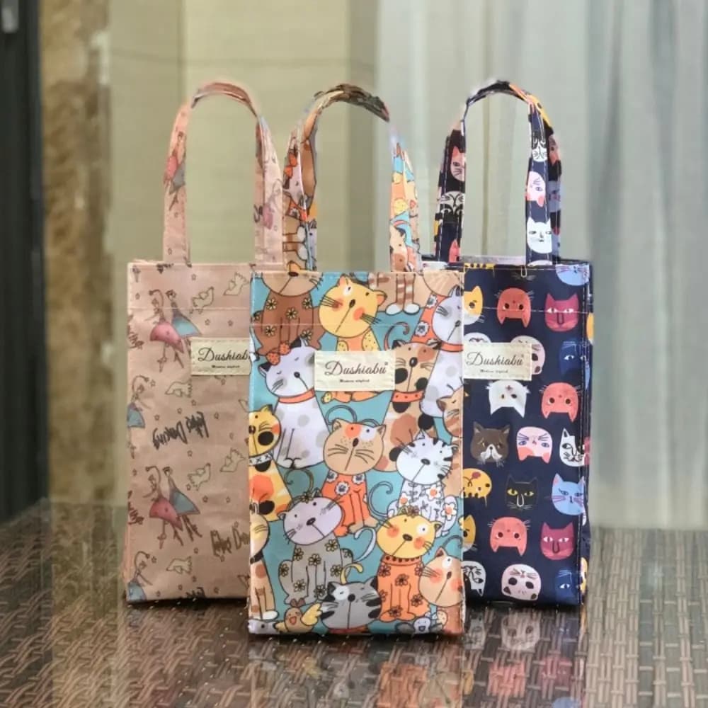 Accessori da campeggio sportivi Porta bottiglia d'acqua Oxford da trasporto a mano Borsa per bottiglia d'acqua con stampa carina Borsa per ombrello impermeabile