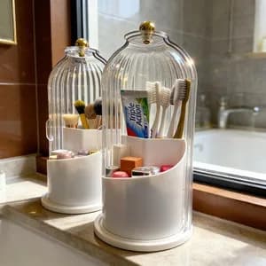 Dust-proof rotating storage box with a transparent sliding cover, 360° free rotation, multiple large compartments, easily stores toothbrushes, toothpaste, makeup brushes, and more.