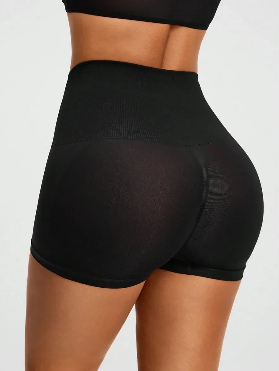 Pantaloncini modellanti neri a vita alta senza cuciture con slip integrato per donna