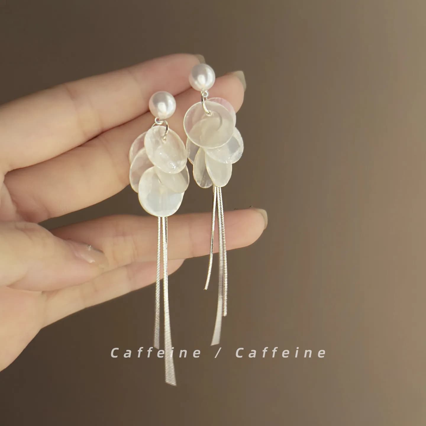 Skinny super fairy French pearl fringed earrings light luxury high sense niche temperament vacation earrings