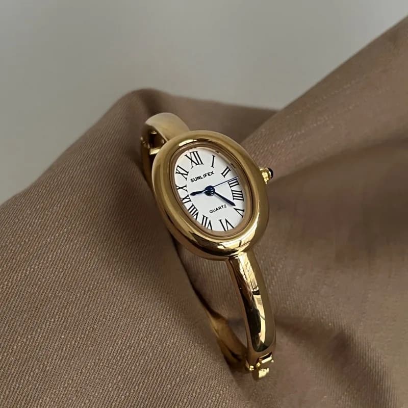 New Women's Watch Gold Diamond-set Light Luxury High-end Small Oval Dial Bracelet Watch Ladies Gifts