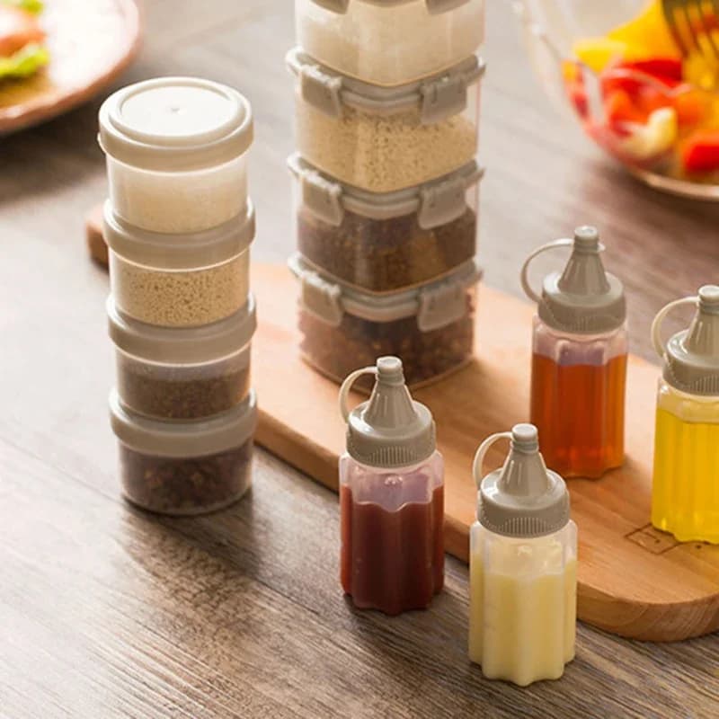 4 pz/set bottiglia di spezie trasparente con coperchio Mini Dispenser portatile per condimenti per salsa barattolo di spezie per sale bottiglia per spremere la salsa