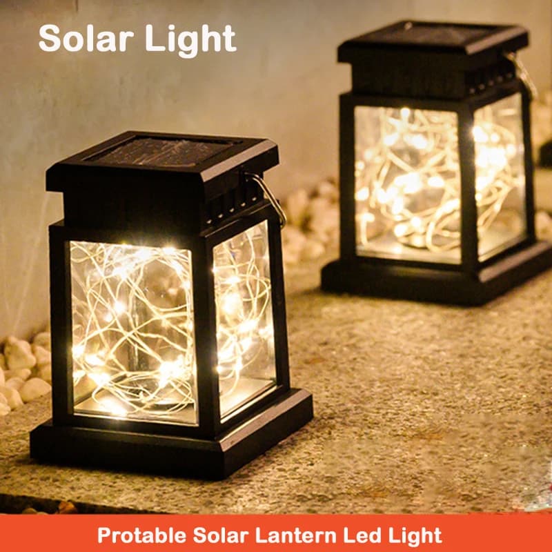 Luci solari a LED Lanterne da pavimento per messa a fuoco esterna Pannello Candela Lampade a sospensione per esterni Lampade per la luce solare Apparecchio per la decorazione del giardino del balcone