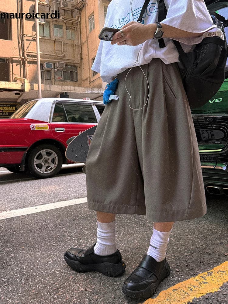 Mauroicardi Pantaloncini Larghi Casual Morbidi e Fluidi Primavera Estate da Uomo con Elastico in Vita, Lunghezza al Polpaccio, Stile Coreano