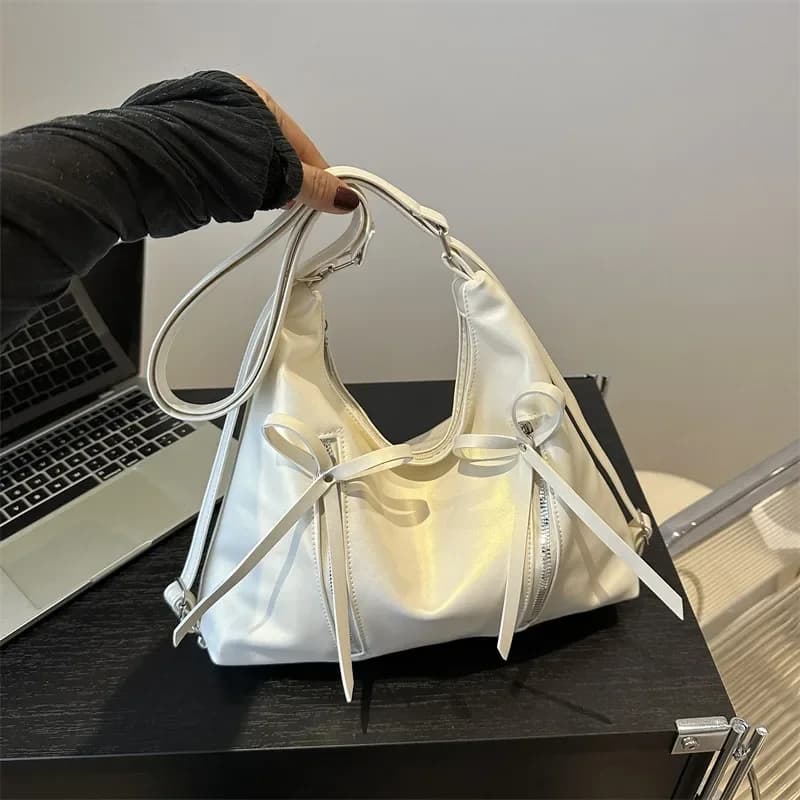 Borsa a tracolla delicata con fiocco alla moda, borsa da ascella da donna versione coreana di nicchia, nuove borse tote versatili