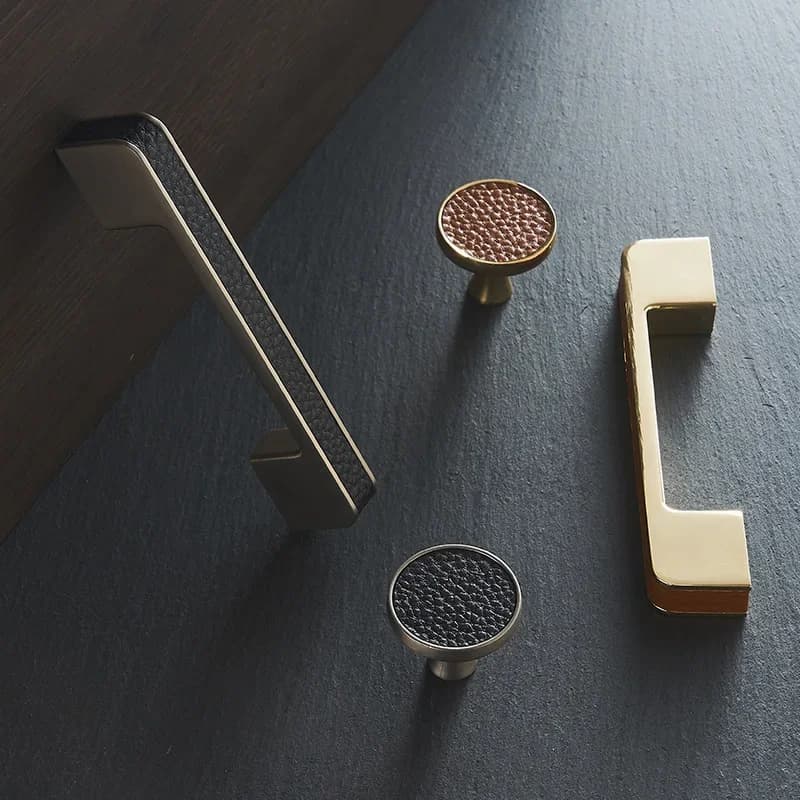 Hardware per pomelli per mobili Maniglie per cassetti per porte dell'armadio in pelle cortical moderna in lega di zinco Manopole e maniglie per porte dell'armadio da cucina