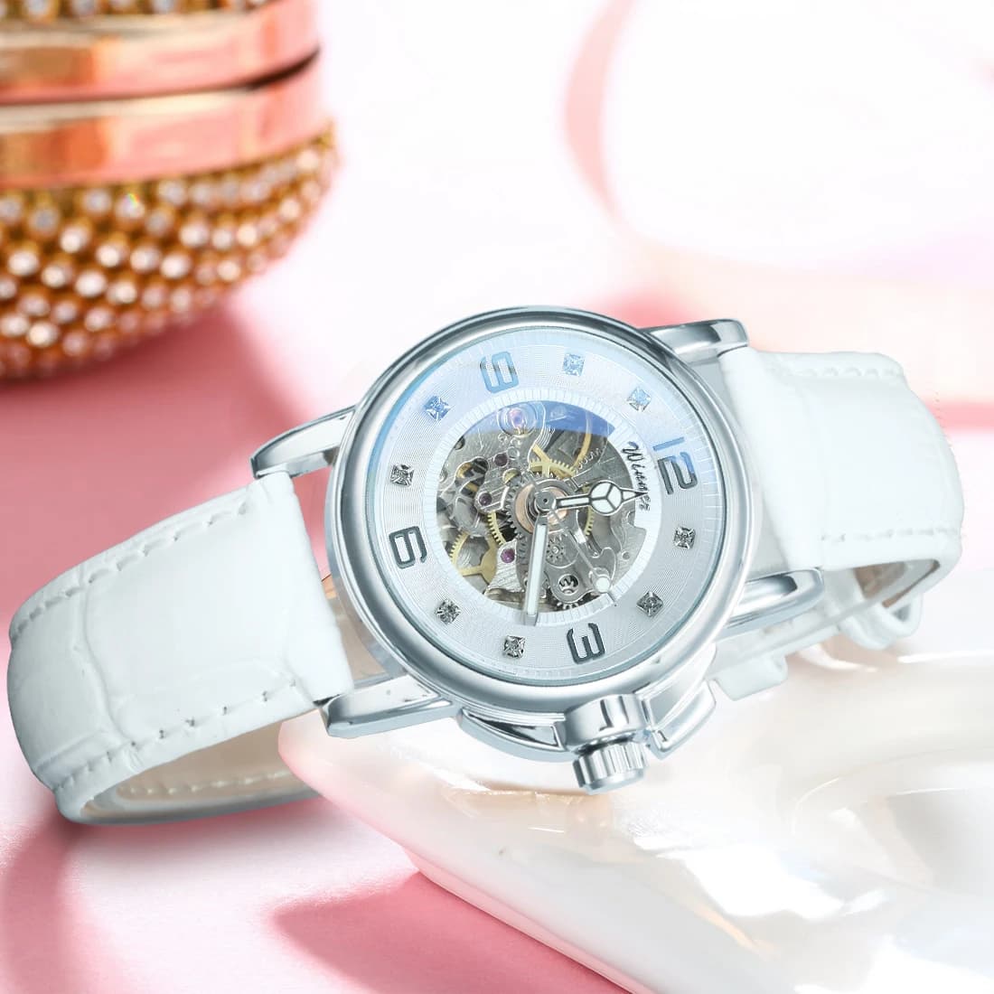 WINNER Elegante orologio meccanico scheletrato per donna Lancette luminose Moda ghiacciata Orologi automatici da donna Cinturino in pelle di lusso