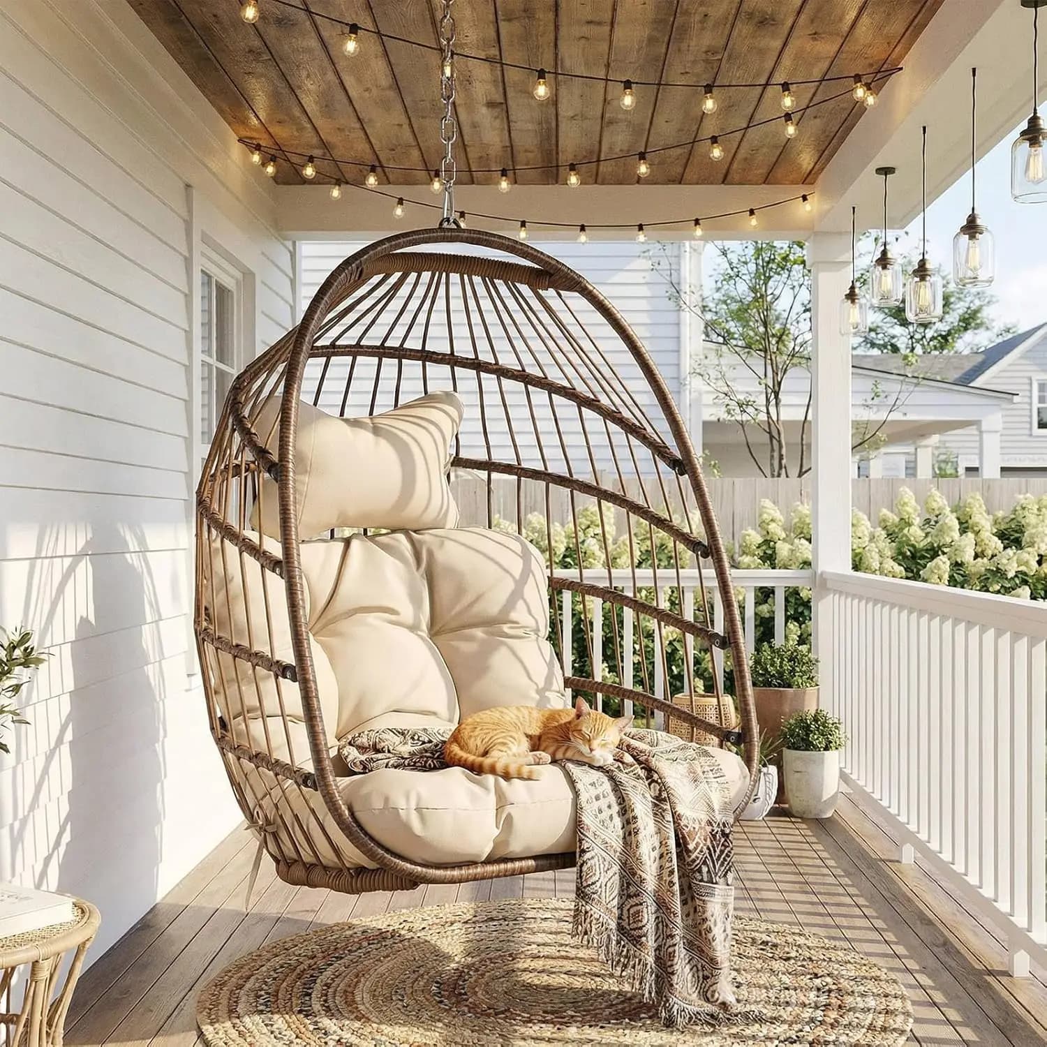 Outdoor hanging rocking chair without support, egg-shaped chair in patio wickers with upholstered cushions, 350 pounds, customizable