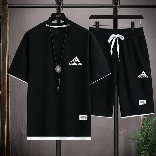 Completo da uomo casual con t-shirt a maniche corte e pantaloncini sportivi, set traspirante e confortevole in tessuto waffle per la corsa, moda estiva, 2026