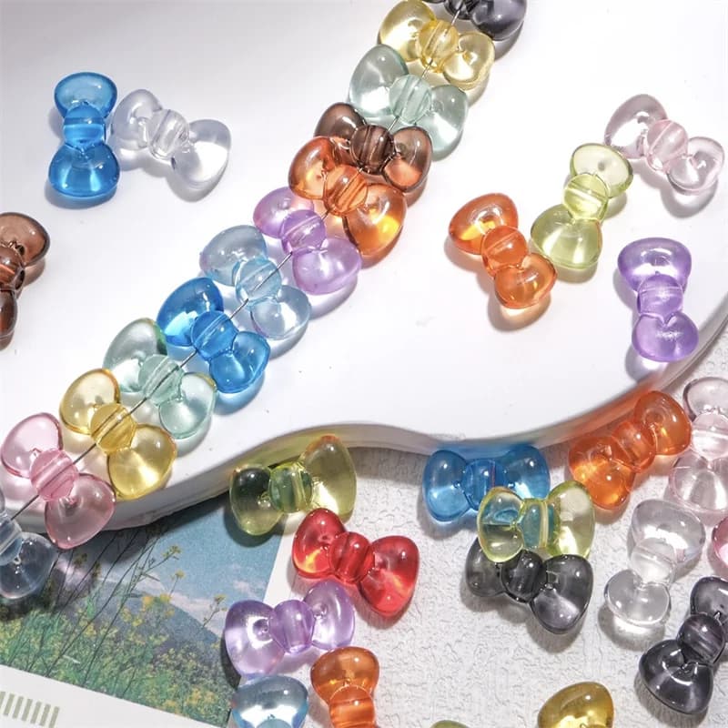 Stile estivo 100 pz/lotto stampa a colori cartone animato a forma di fiocco acrilico bowkont perline gioielli fai da te accessorio braccialetto indumento