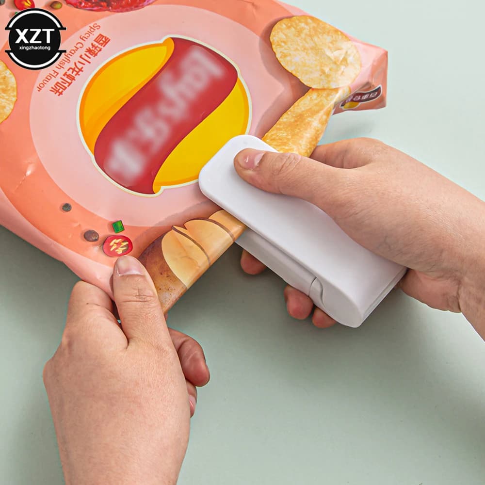 Mini sigillatrice portatile per snack, sacchetti per alimenti, sigillatrice in plastica, macchina per sigillare il calore a pressione manuale domestica, utensili da cucina