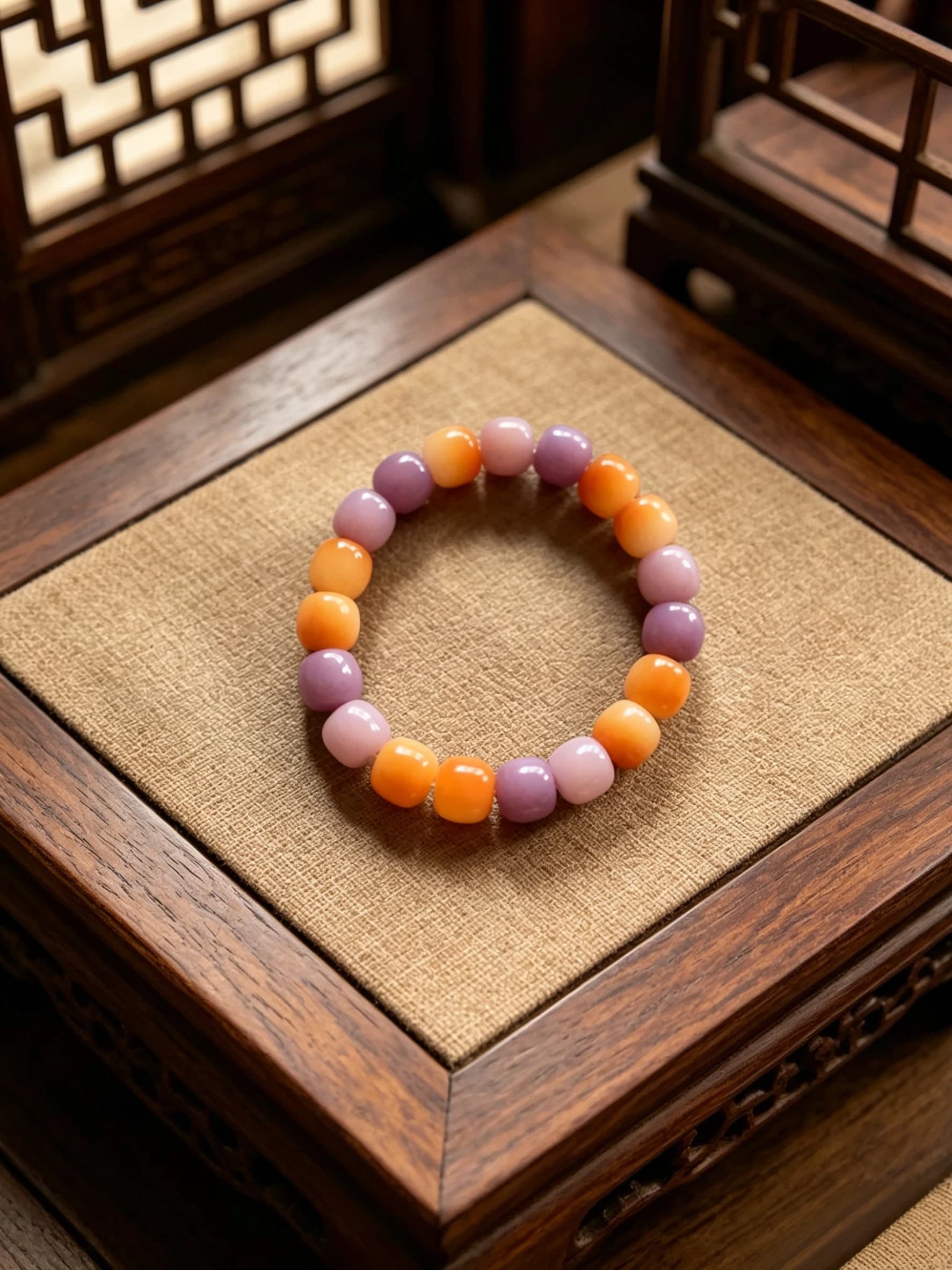 Bracciale con perle a barilotto in radice di Bodhi sfumato taro e arancione