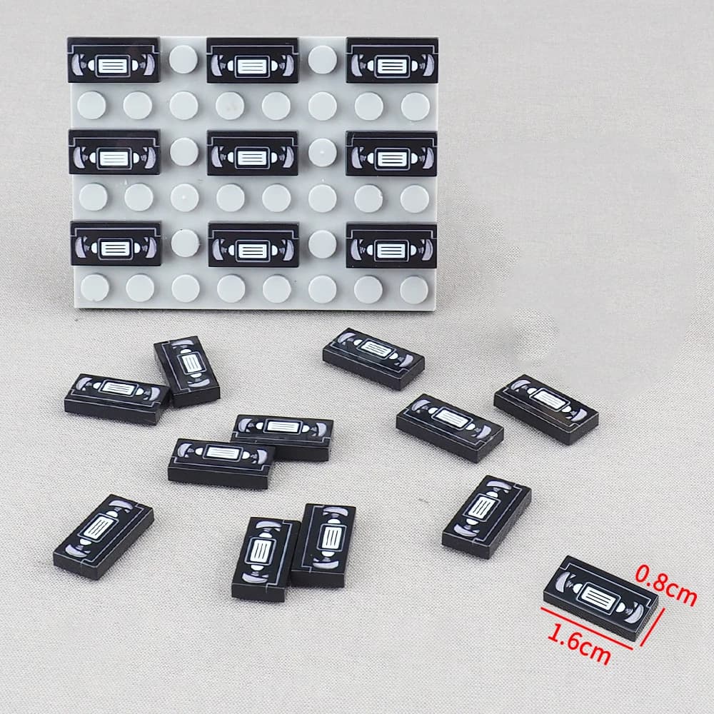 MOC 10 Pezzi 3069 3069pb Sistema di Mattoncini per Costruzioni, Pannello Strumenti Stampato con Motivo Video VHS, Giocattolo per Ragazzi