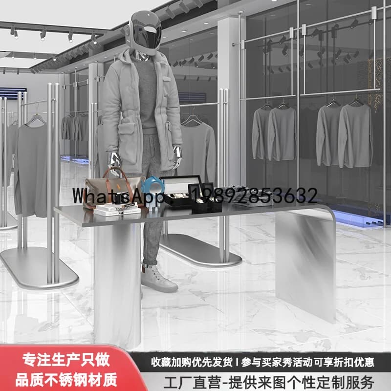Negozio di abbigliamento Bancone dell'isola Contatore di flusso Bancone espositore in acciaio inossidabile spazzolato argento Espositore per prodotti Borse per scarpe da tavolo