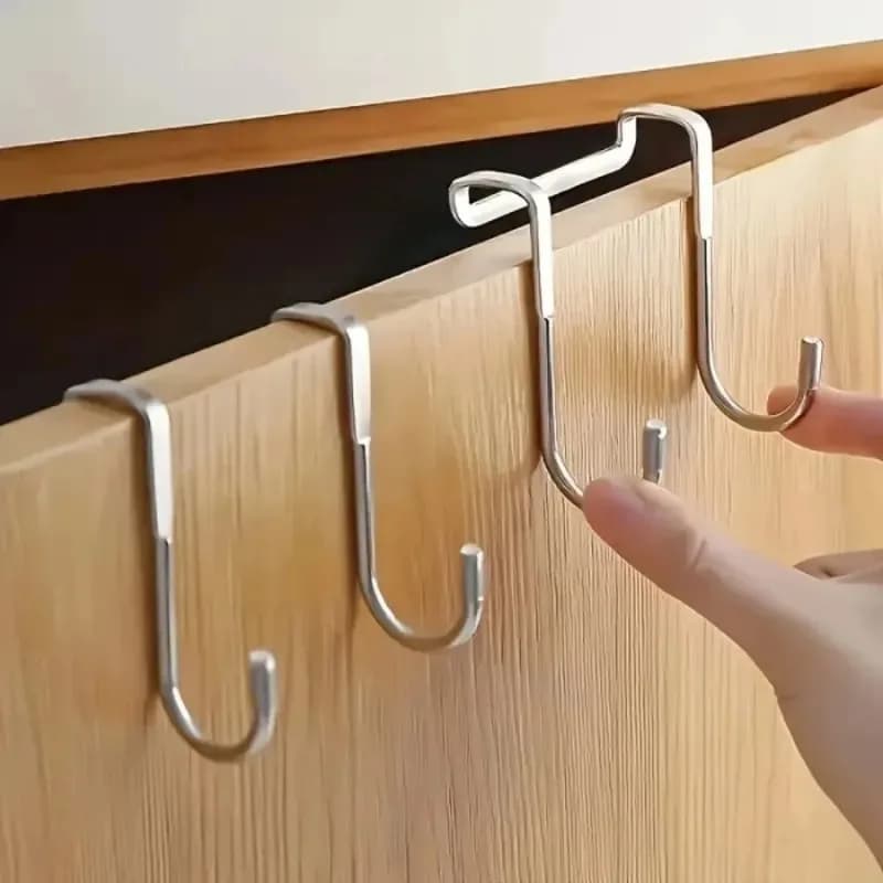 Silver metal hook without joints, suitable for kitchens, bathrooms and cabinets, does not require drilling, easy to install.