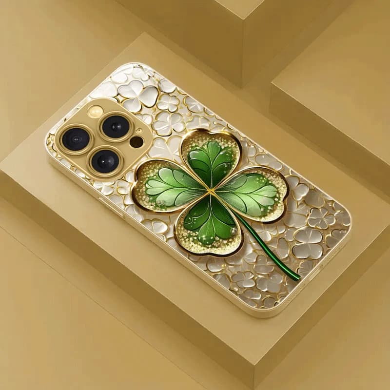 Gold and green contrasting four-leaf clover pattern metallic paint glass phone case for iPhone 16/16Plus/16Pro/16ProMax/15