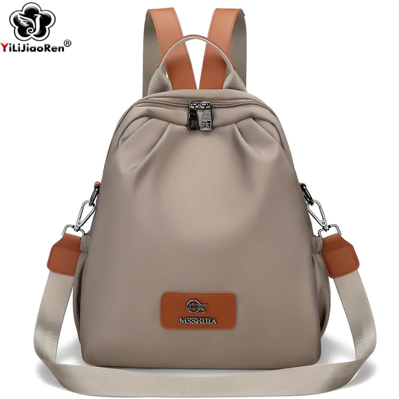 Zaino casual da donna Zaino in nylon di marca Borsa a tracolla femminile Borsa da scuola semplice e portatile Zaino da viaggio leggero da donna