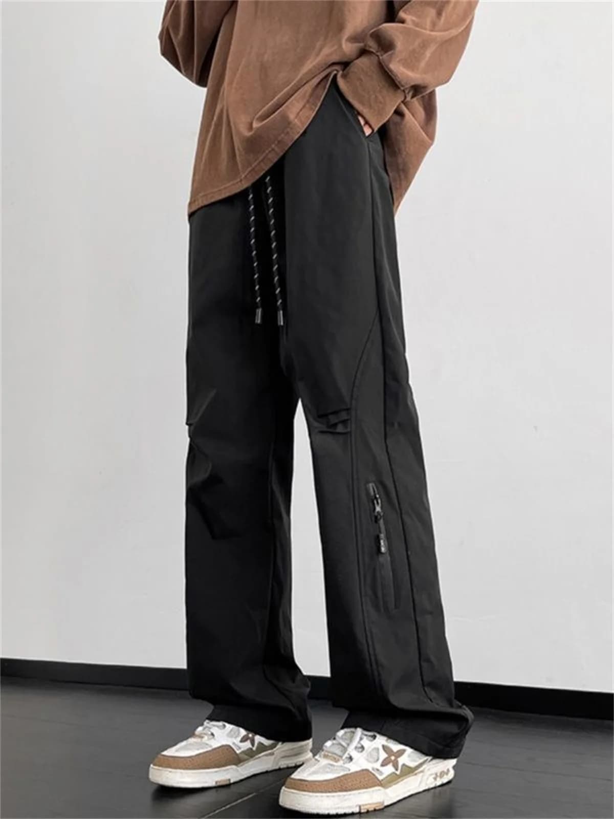 Pantaloni da lavoro neri primaverili ed estivi da uomo, nuovi, sottili, tinta unita, alla moda, larghi e versatili, pantaloni casual dritti per escursionismo