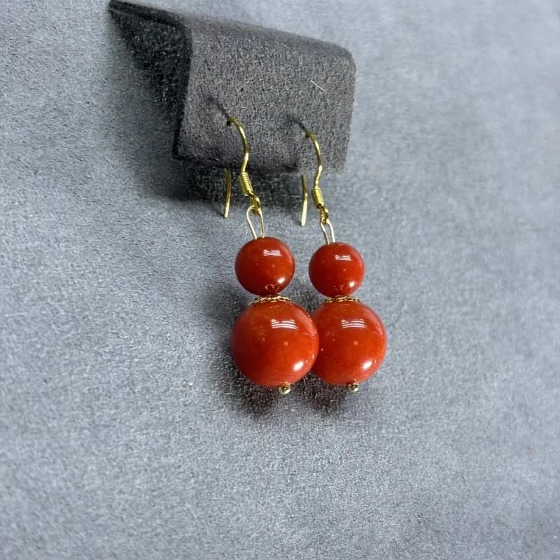New earrings with red beads, classic earrings in fashionable ethnic style