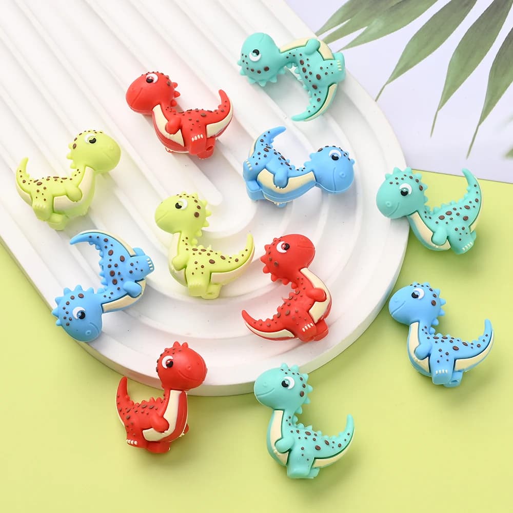 5 pezzi di perline in silicone a forma di dinosauro colorate e carine per catenelle portaciuccio fai da te, penne con perline, portachiavi e accessori per gioielli